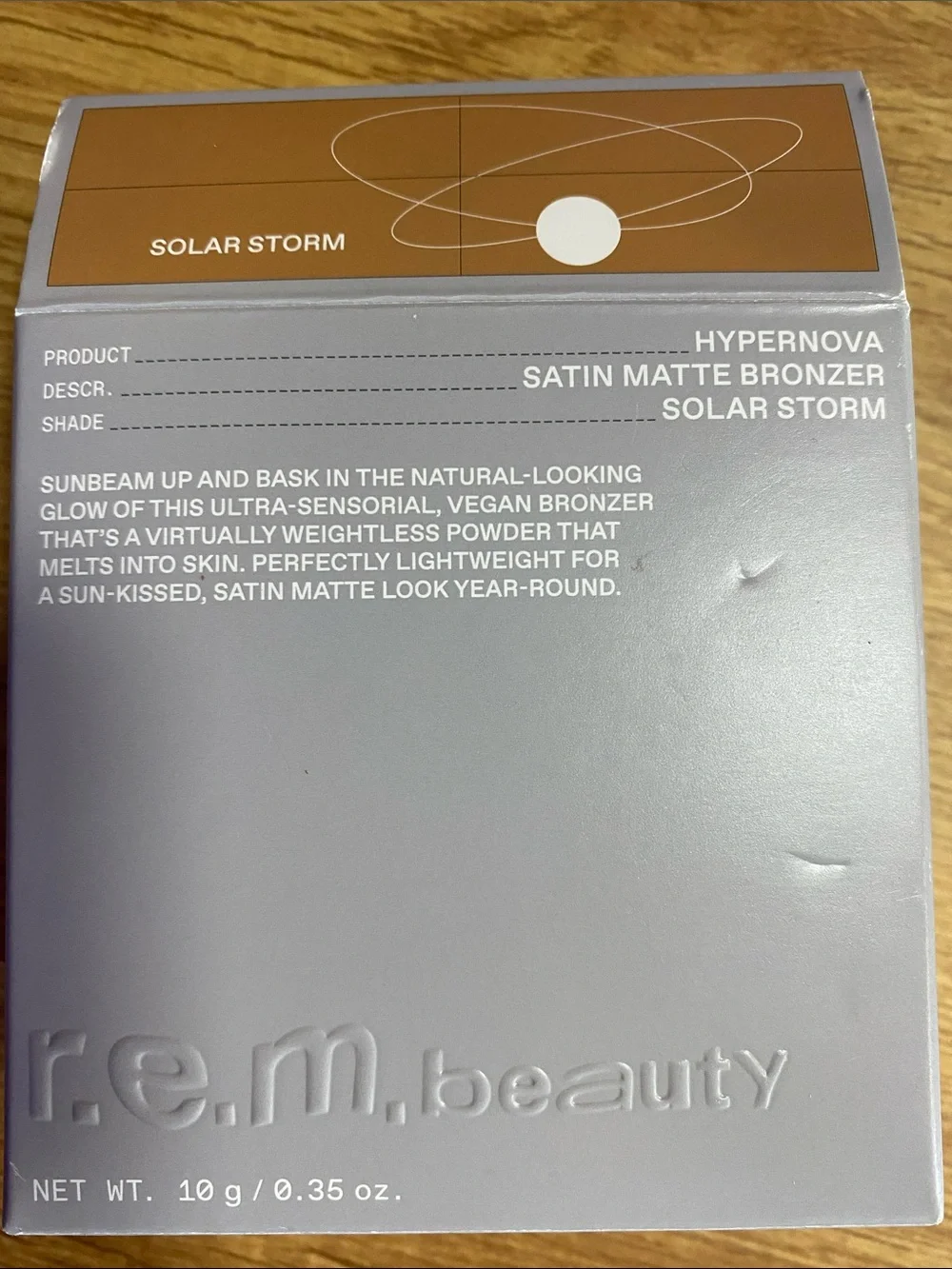 r.e.m. beauty Satin Matte Bronzer - Solar Storm (Brown)